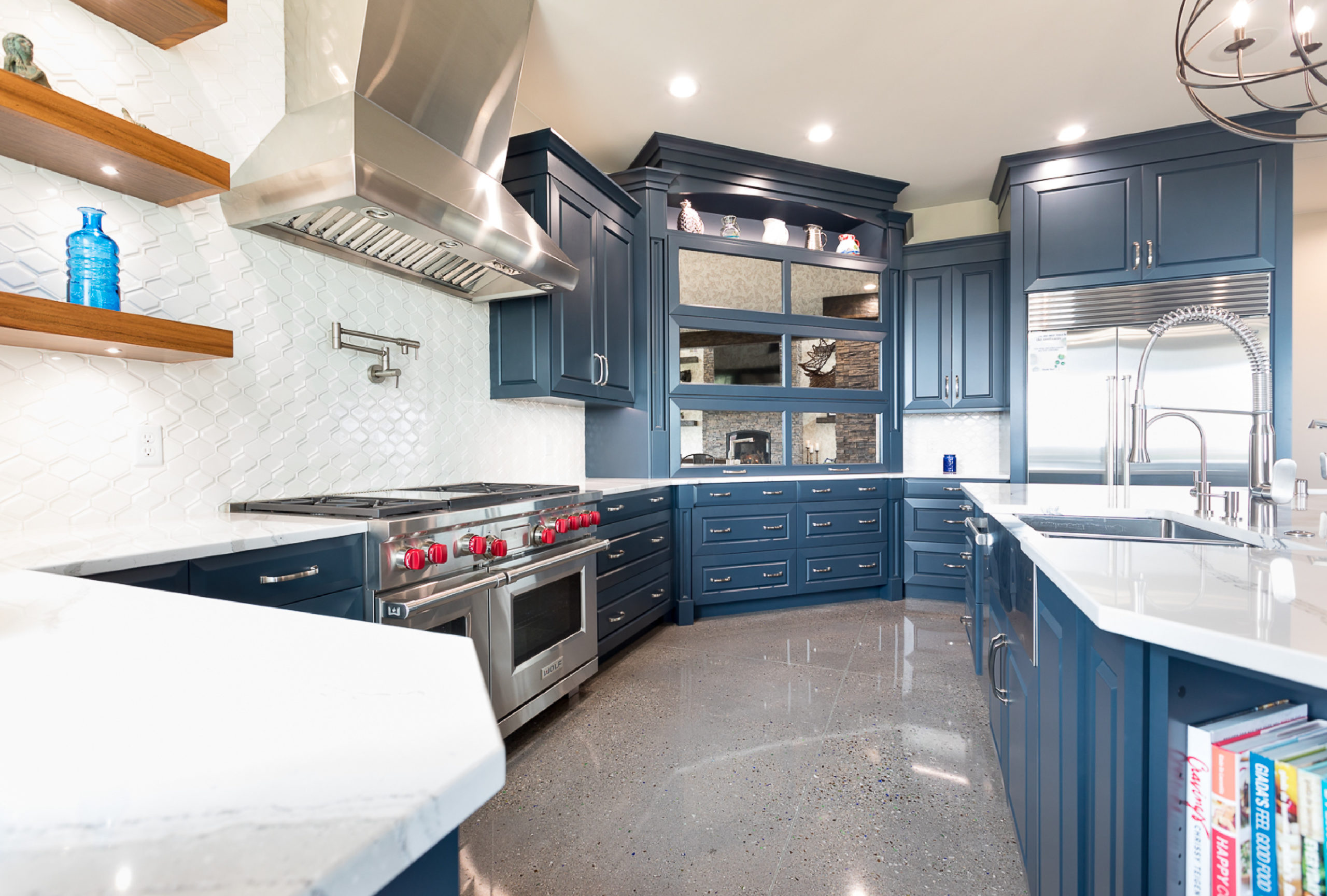 Navy blue kitchen designed by Ban Construction